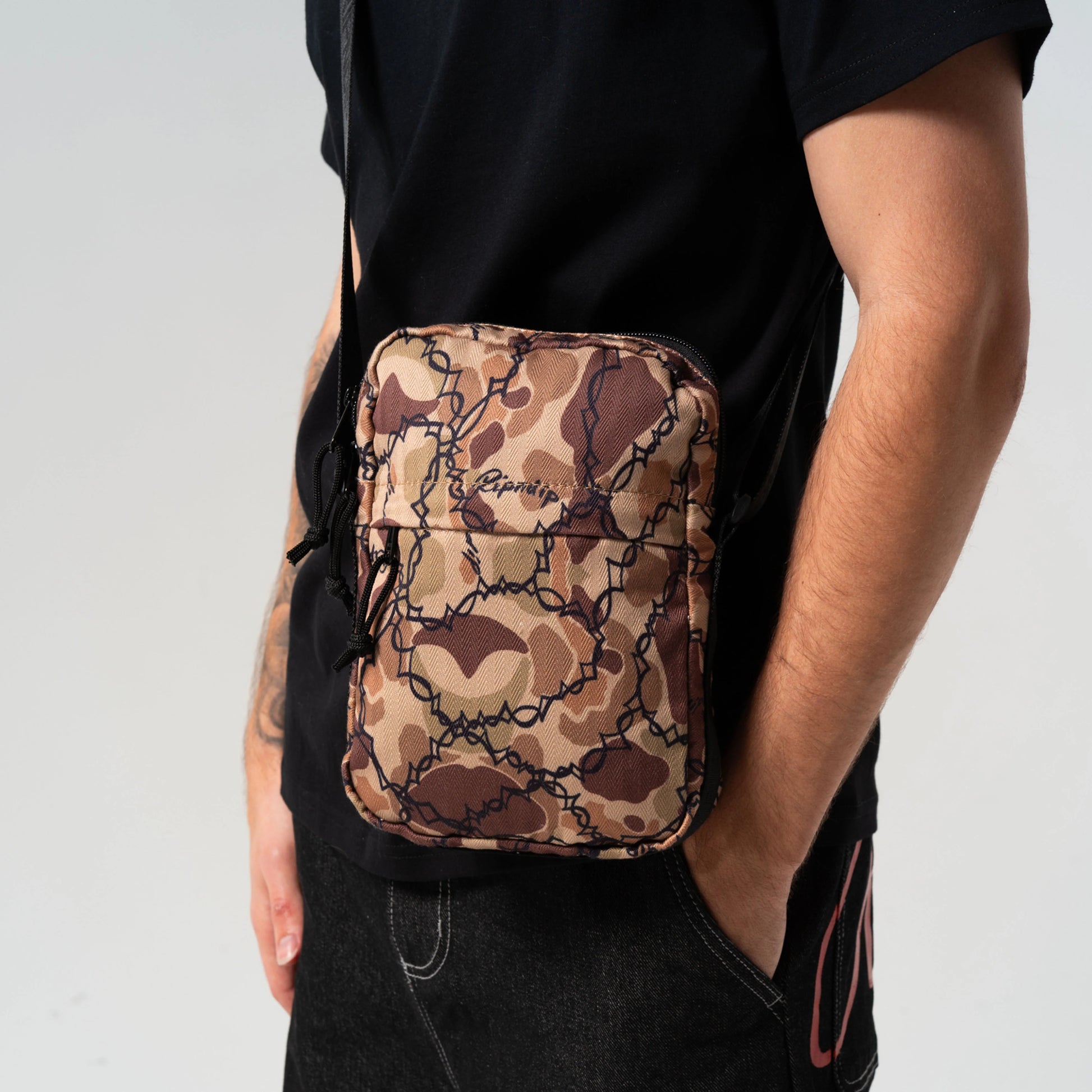 WIRED CROSS BODY BAG (TAN CAMO)