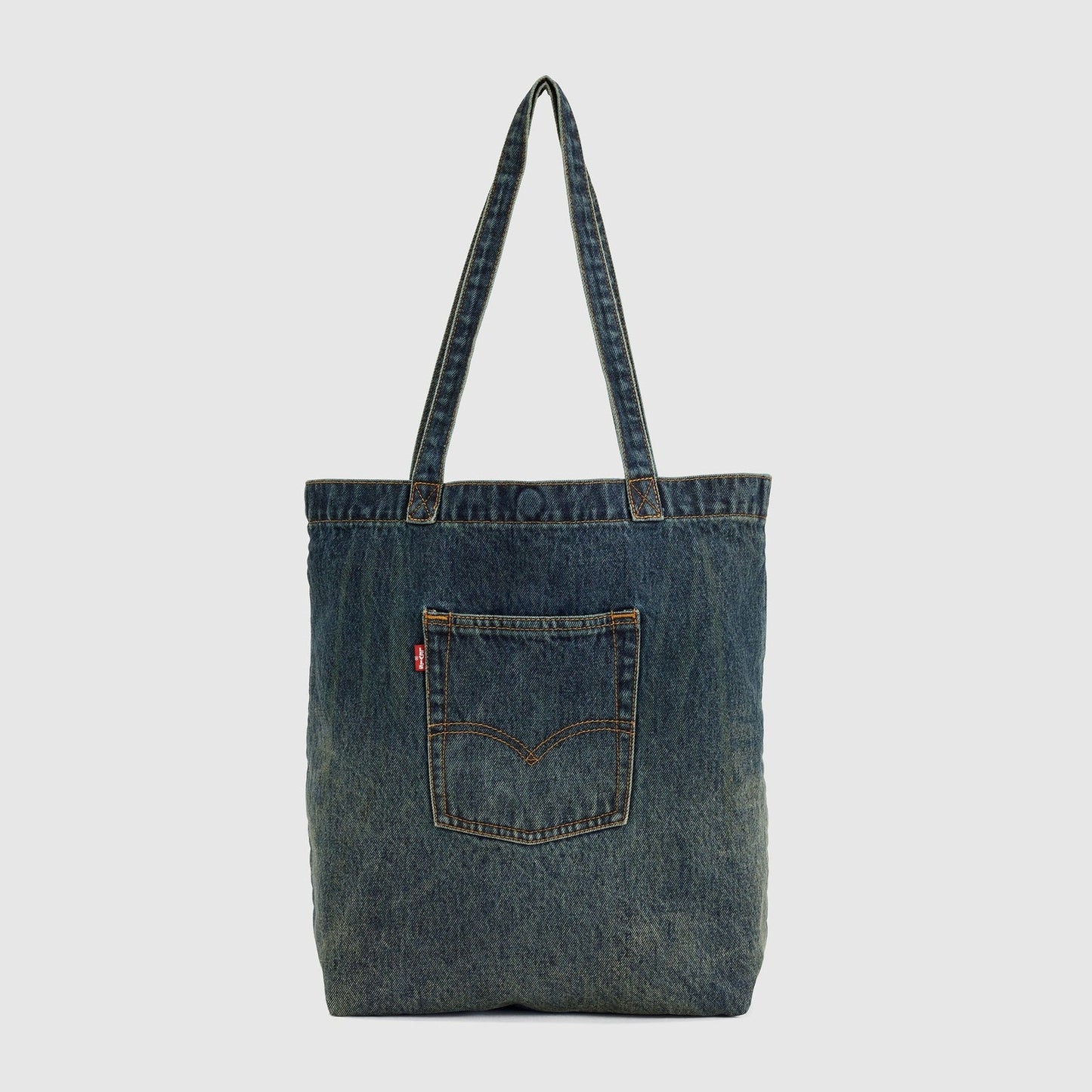 LEVIS'S TOTE LAID IN THE MEADOW